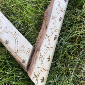 Alex progress - caption _Prototype for my upcoming piece, _Guided by reflections_, for the Urban Moorings Two project, curated by Nora Hutchinson & Alexis Moline! It will eventually be a life sized Hodinöhsö_ni' sk wooden triangle with burned designs