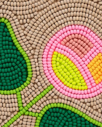 Mosaic of flower made from wooden beads