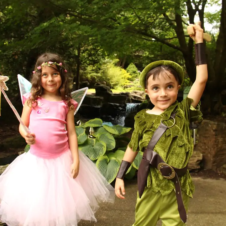 Two children in the Rock Garden dressed as fairies