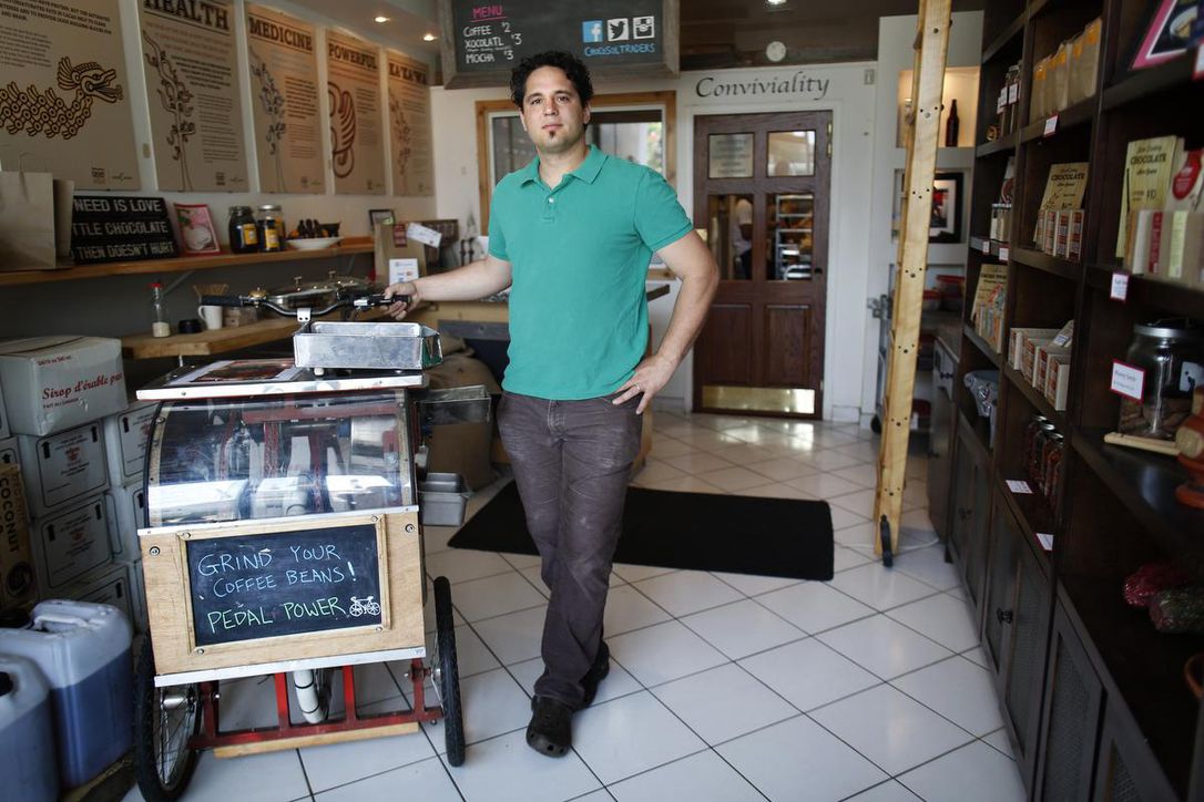 Michael Sacco standing in a small chocolate shop