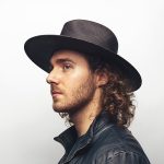 Side portrait of Ryan Gazzola wearing a wide brimmed hat