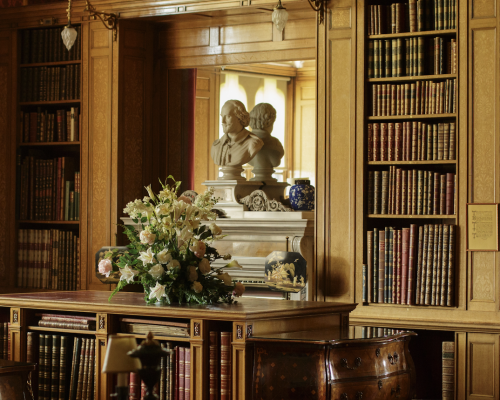 Screen Shot 2025-04-25 at 9.42.52 AM floral arrangement within a large study from the set of Downton Abbey