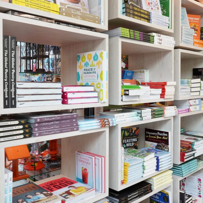 Garden Shop shelves stocked with various books of all genres