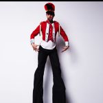 The Biggest Little Drummer Boy person in stilts dressed as a drummer boy