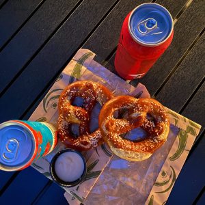 afterdark-pretzels-drinks (1) (1) two soft pretzels and two canned drinks