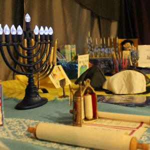 c. Hanukkiah display, 2019-2020 torah Hanukkiah and Torah