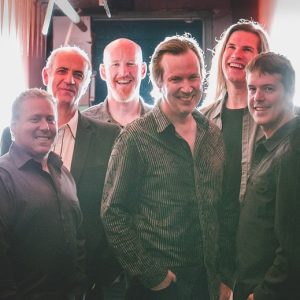 dave murphy band Dave Murphy Band; 6-person band posing in a hallway