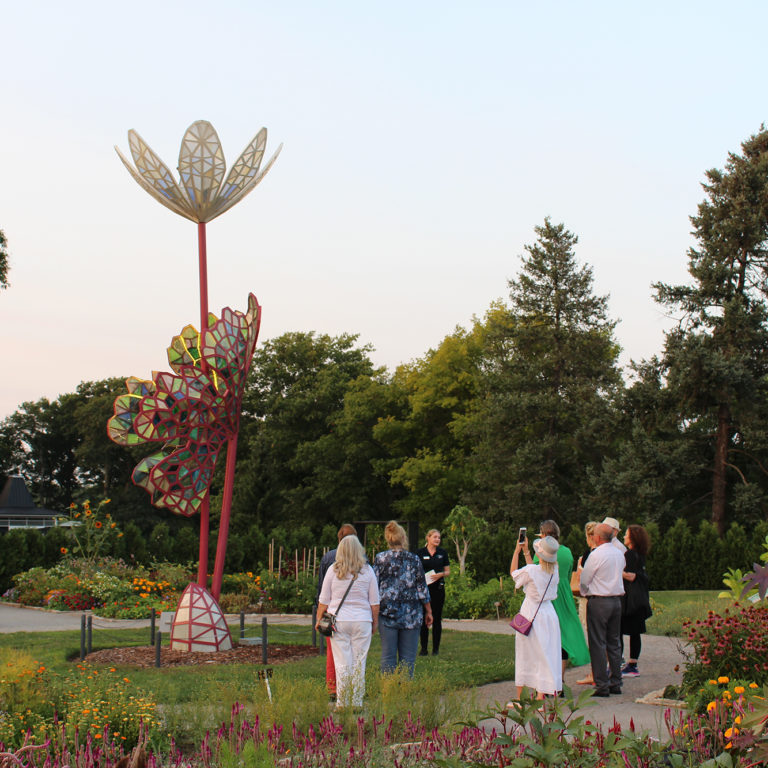 Group Looking at Bloodroot Sculpture