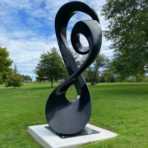 overture by jeremy guy overture, steel sculpture resembling a treble clef