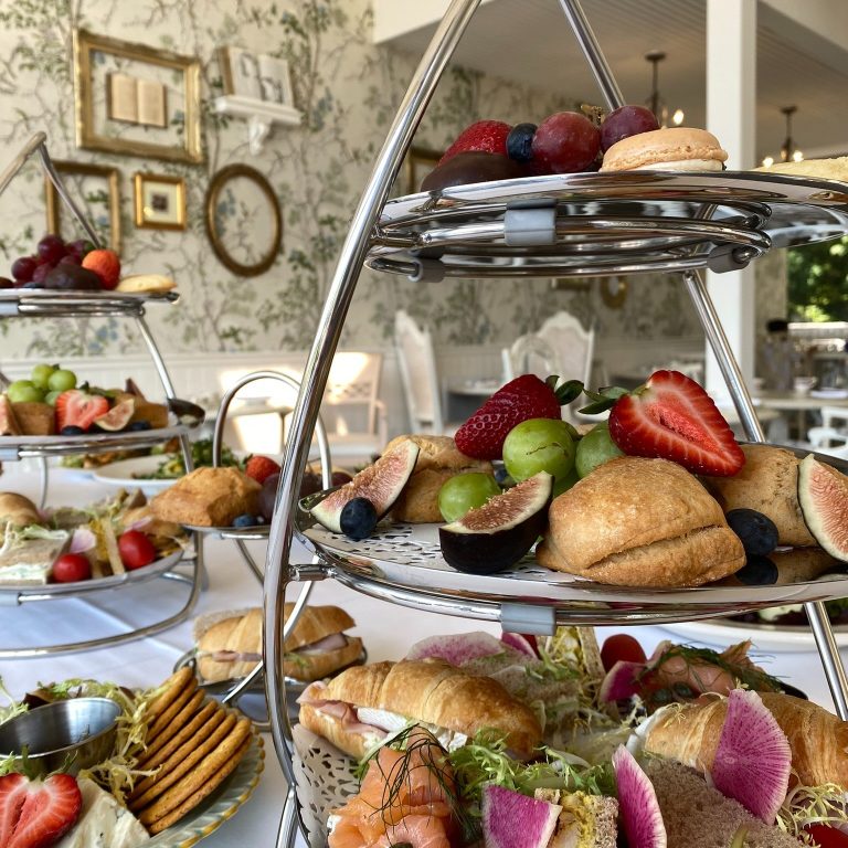 selection of tiered tea trays with tea sandwhiches