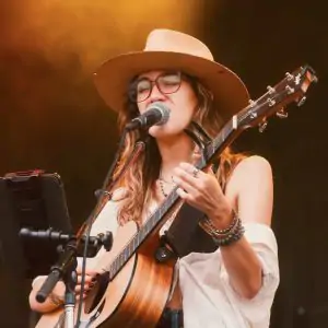 kat steeves Kat Steeves playing guitar and singing on stage
