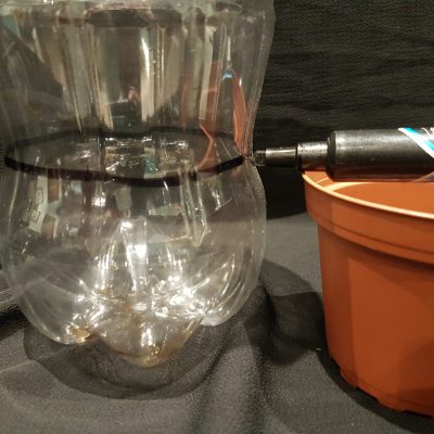 making-guide-lines-marker Hourglass-shaped coke bottle showing how to mark cutting lines. Turn the bottle, not the pen.