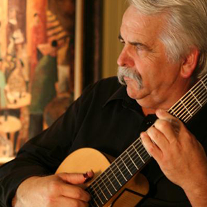 michael-maguire-300 Michael Maguire playing guitar