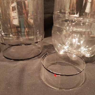 nested-pop-bottles-closeup Close up view of plastic nested pop bottles