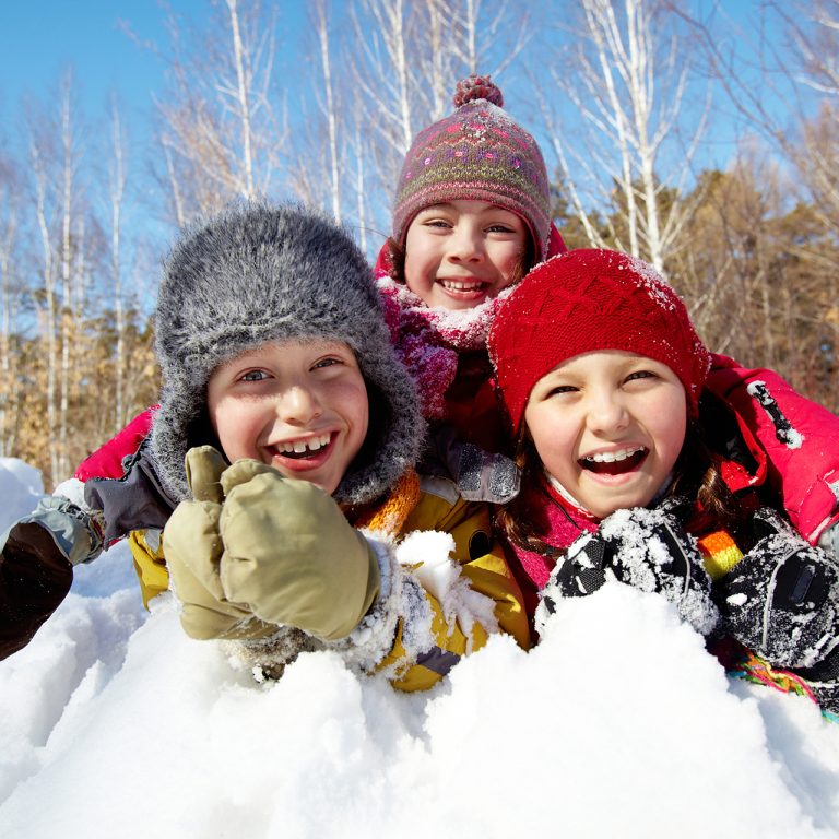 Happy Kids in Winter snow